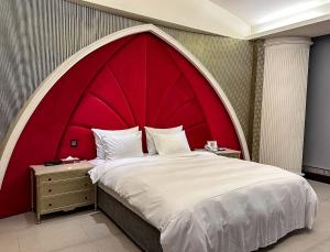 Postel nebo postele na pokoji v ubytování All-Ur Boutique Motel-Ping Tung Branch