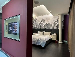 Postel nebo postele na pokoji v ubytování All-Ur Boutique Motel-Ping Tung Branch