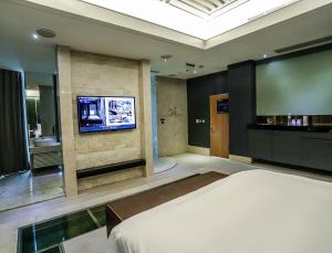 TV a/nebo společenská místnost v ubytování All-Ur Boutique Motel-Ping Tung Branch