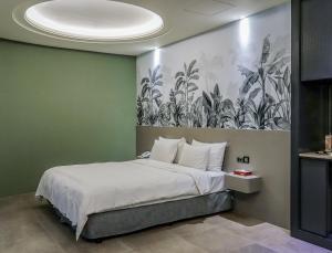 Postel nebo postele na pokoji v ubytování All-Ur Boutique Motel-Ping Tung Branch