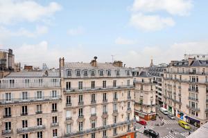 an aerial view of buildings in a city at Modern Loft 2BDR Place des Ternes in Paris