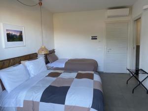 Postel nebo postele na pokoji v ubytování B&B Ramerino