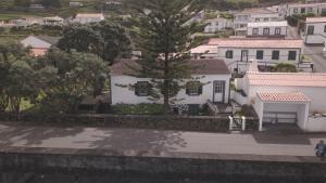 a view of a city with white houses at Terra`s Place in Santo Amaro
