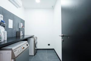Kuchyň nebo kuchyňský kout v ubytování Aparthotel Colombo Roma
