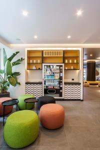 Lounge nebo bar v ubytování Aparthotel Colombo Roma
