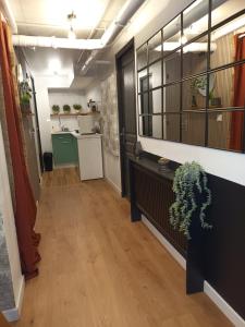 Kuchyň nebo kuchyňský kout v ubytování Appartement tout confort