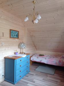 Letto o letti in una camera di Agroturystyka Przy Siole Budy