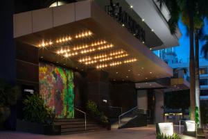 a building with a bunch of lights on it at Le Meridien Panama in Panama City