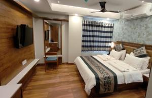 Postel nebo postele na pokoji v ubytování Hotel GRT Square
