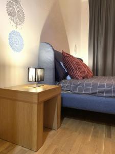 A bed or beds in a room at Golem