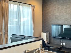 TV a/nebo společenská místnost v ubytování 72 Mt View - B棟 -