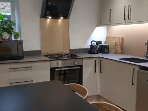 Una cocina o kitchenette en Trade Digs Ryeleaze Road