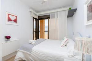 Posteľ alebo postele v izbe v ubytovaní Beach Haven by Fidalsa