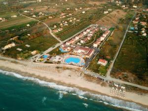 an aerial view of a resort on the beach at Almyros Beach in Acharavi