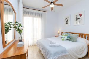Posteľ alebo postele v izbe v ubytovaní Beach Haven by Fidalsa