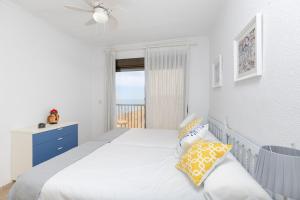 Posteľ alebo postele v izbe v ubytovaní Beach Haven by Fidalsa