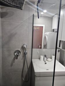 Koupelna v ubytování Apartman Cvijetinovic