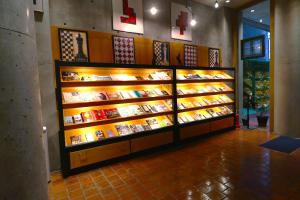 a display case in a store with books at Hotel Landmark Umeda in Osaka