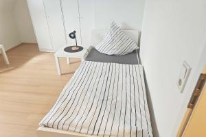 A bed or beds in a room at 3 room apartment in Eschweiler