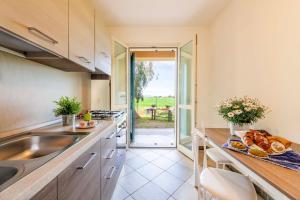 Kuchyň nebo kuchyňský kout v ubytování Casa Vacanze Vignarca - Località Perelli + 28 fotografií