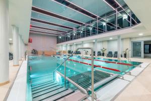Bazén v ubytování DW Atrium nebo v jeho okolí