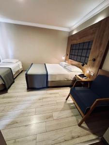 Postel nebo postele na pokoji v ubytování Laodikya Hotel