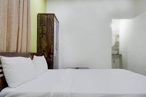 Фотография из галереи Hotel O Mango Tree Lodging в городе Пуна +24 фотографии