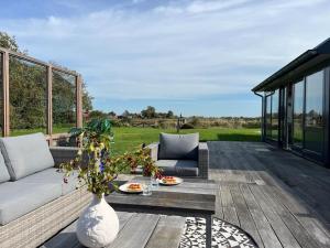 Ruang duduk di Vakantiewoning 't Veldje
