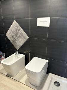 WGRb&b في بوتنزا: حمام به مرحاض أبيض ومغسلة