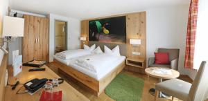 Postel nebo postele na pokoji v ubytování Hotel Sonnentau