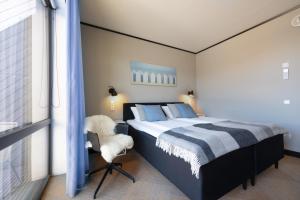 Voodi või voodid majutusasutuse StayBliss Haven Kakumäe toas +31 fotot