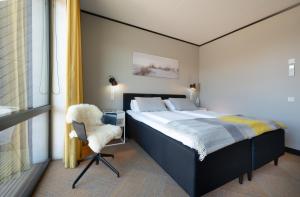 Ένα ή περισσότερα κρεβάτια σε δωμάτιο στο StayBliss Haven Kakumäe
