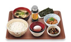 a tray of food with rice and other ingredients at Ueno Frex Hotel in Iga