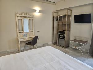 Postel nebo postele na pokoji v ubytování Hotel YIT Casa Grande