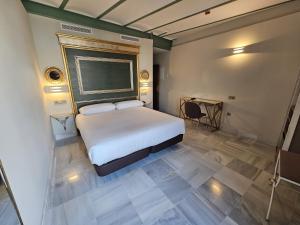 Postel nebo postele na pokoji v ubytování Hotel YIT Casa Grande