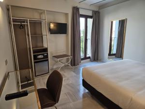 Postel nebo postele na pokoji v ubytování Hotel YIT Casa Grande