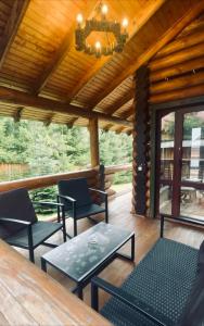 Posezení v ubytování Cottage PolyaNitsa окремий котедж з каміном
