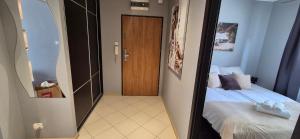 Ένα ή περισσότερα κρεβάτια σε δωμάτιο στο APARTAMENT SORENTO 9