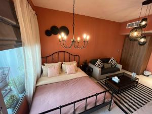 Postel nebo postele na pokoji v ubytování Stylish studio in Masdar