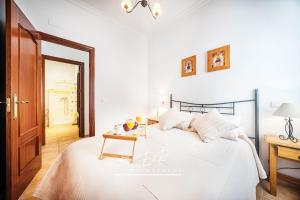 Łóżko lub łóżka w pokoju w obiekcie Impresionante Casa de Campo, Alora, Málaga