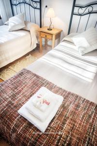 Łóżko lub łóżka w pokoju w obiekcie Impresionante Casa de Campo, Alora, Málaga