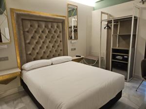 Postel nebo postele na pokoji v ubytování Hotel YIT Casa Grande
