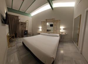 Postel nebo postele na pokoji v ubytování Hotel YIT Casa Grande