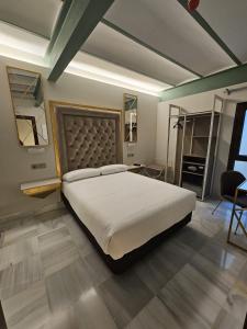Postel nebo postele na pokoji v ubytování Hotel YIT Casa Grande