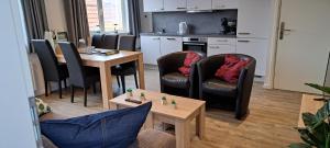 Гостиная зона в 105,4 appartement 200m van strand