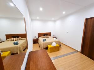 Ένα ή περισσότερα κρεβάτια σε δωμάτιο στο Casa Torbit, Apartment in Arco da Calheta
