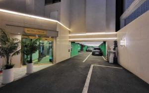 a parking garage with a car parked in it at Cheese Hotel Seomyeon in Busan