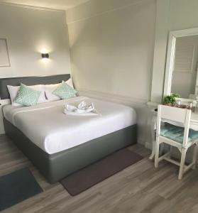 Ένα ή περισσότερα κρεβάτια σε δωμάτιο στο Chanmel Riverside