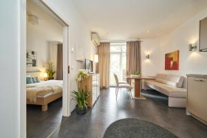Postel nebo postele na pokoji v ubytování Hotel am Hof