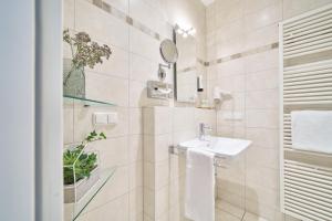 Koupelna v ubytování Hotel am Hof